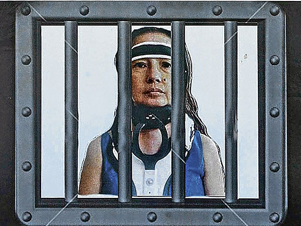 A militant group in wishful-thinking mode held up this poster of ex-President Gloria Macapagal-Arroyo behind bars during a rally outside the Supreme Court on Friday. Backing Leila de Lima, they called on the court to lift the TRO letting Arroyo leave the country. LYN RILLON