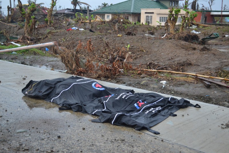 Cadavers awaiting retrieval at a village in Tacloban City. PHOTO BY KRISTINE SABILLO/INQUIRER.net