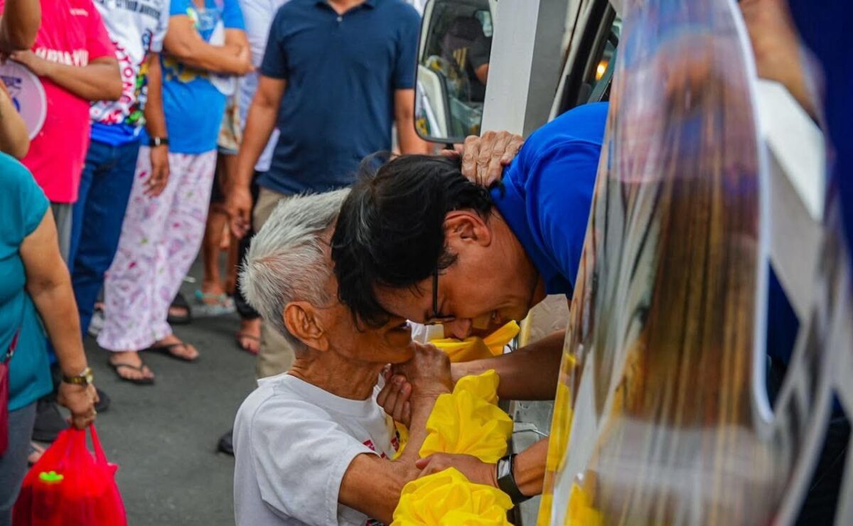 Abalos with a senior citizen in one of his recent sorties