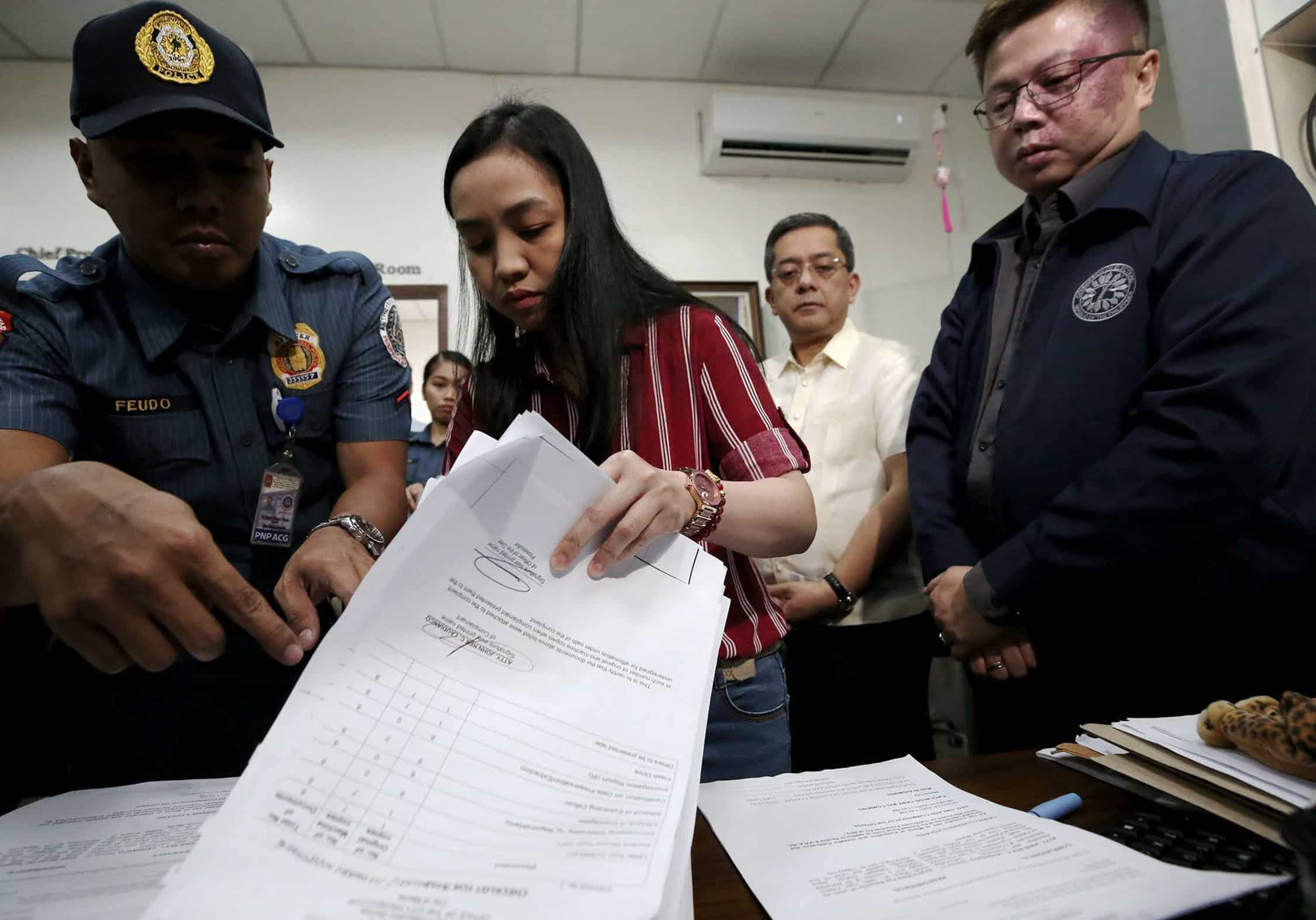 ‘MISINFORMATION’ The Manila city prosecutor’s officereceives a cybercrime complaint filed by the Commission on Elections, led by Chair George Erwin Garcia (second from right), against an Isabela vice mayoral candidate who claimed that the vote-counting machines can be manipulated.