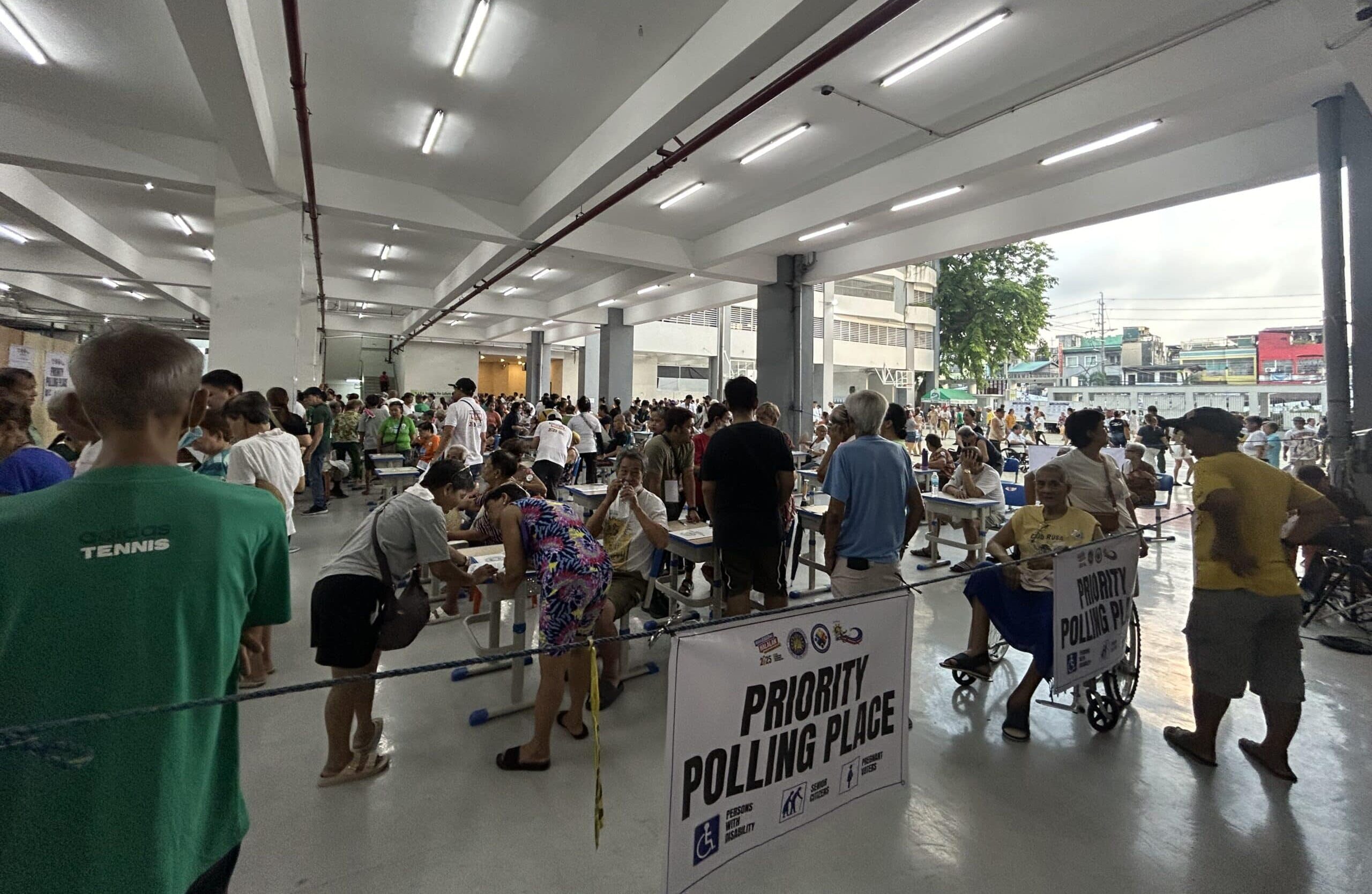 PHOTO: Priority polling place at Rosauro Almario Elementary School in Tondo, Manila. FOR STORY: Priority voters wait for hours in some Manila poll places
