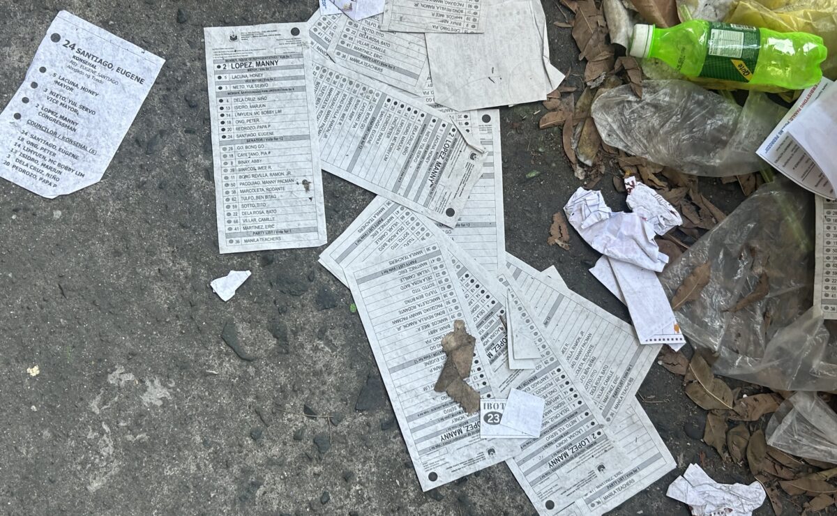 Sample ballots and campaign materials are seen strewn around Manila schools on election day, May 12.