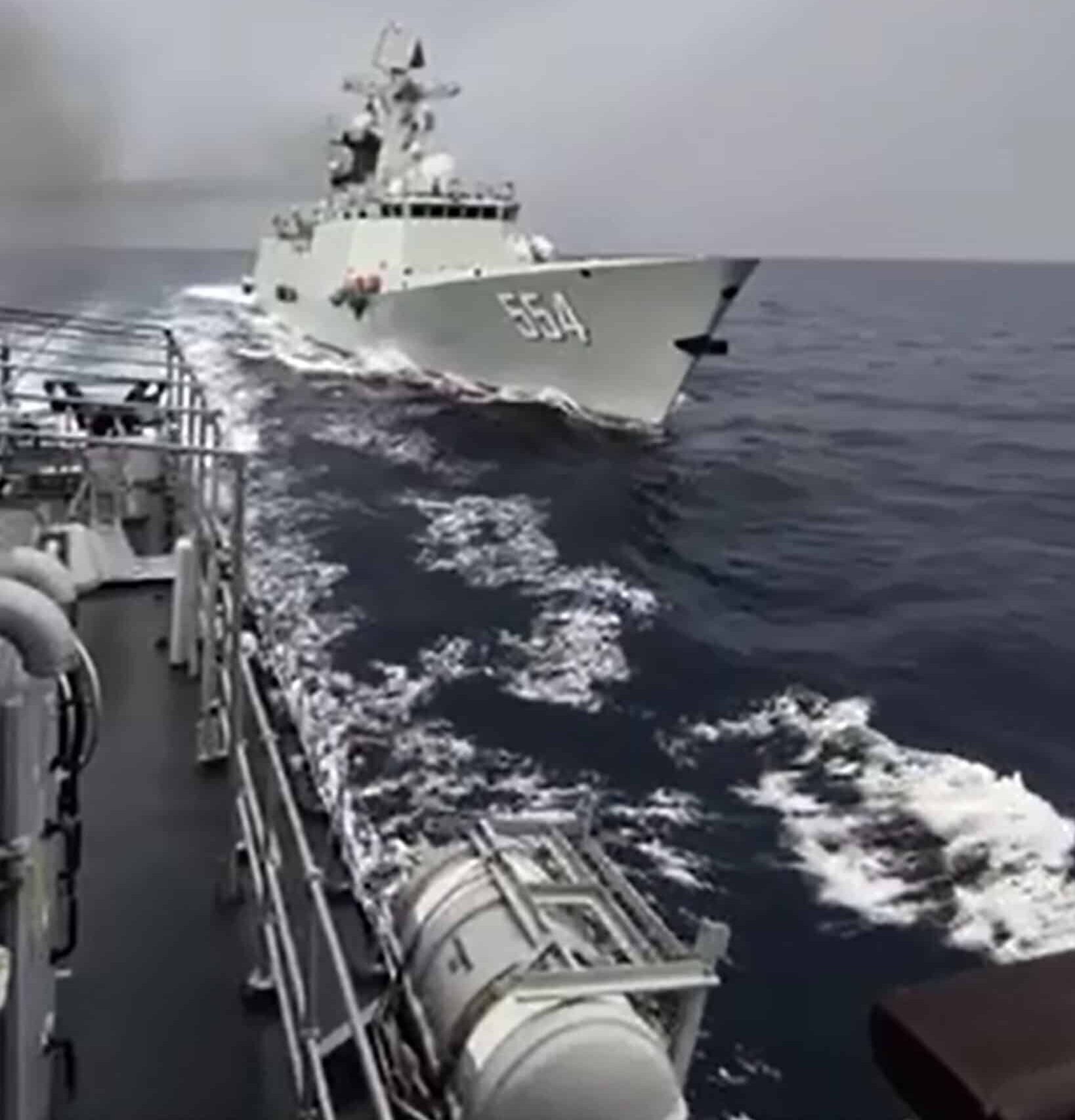 RECKLESS ACTIONS Chinese Navy’s Jiangkai II-class frigate with bow No. 554 dangerously tails the Philippines’ BRP Emilio Jacinto (PS35) on May 5. The Philippine vessel was conducting lawful maritime operations near Panatag (Scarborough) Shoal when two Chinese ships were documented to make risky maneuvers.