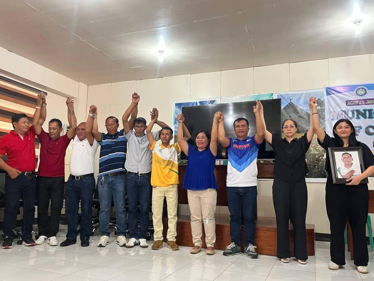 Mayor-elect Jamila Ruma, who substituted for her slain father, Mayor Joel Ruma, poses with supporters during her proclamation in Rizal, Cagayan, early Tuesday morning. (Photos courtesy of LGU Rizal/Jamila Ruma)
