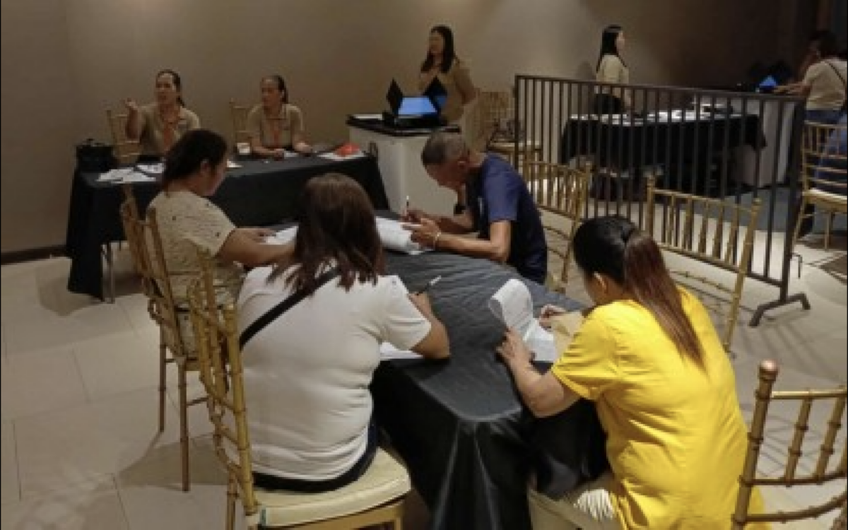 TESTING AND SEALING. The Commission on Elections, Iloilo City, conducts the final testing and sealing of automated counting machines intended for mall voting on Monday (May 5, 2025).