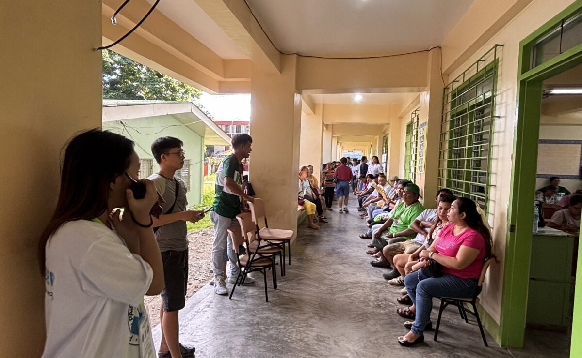 Residents are waiting for their turn to cast their votes at Tagbilaran City Central School on Monday in Tagbilaran City, Bohol on Monday, May 12.