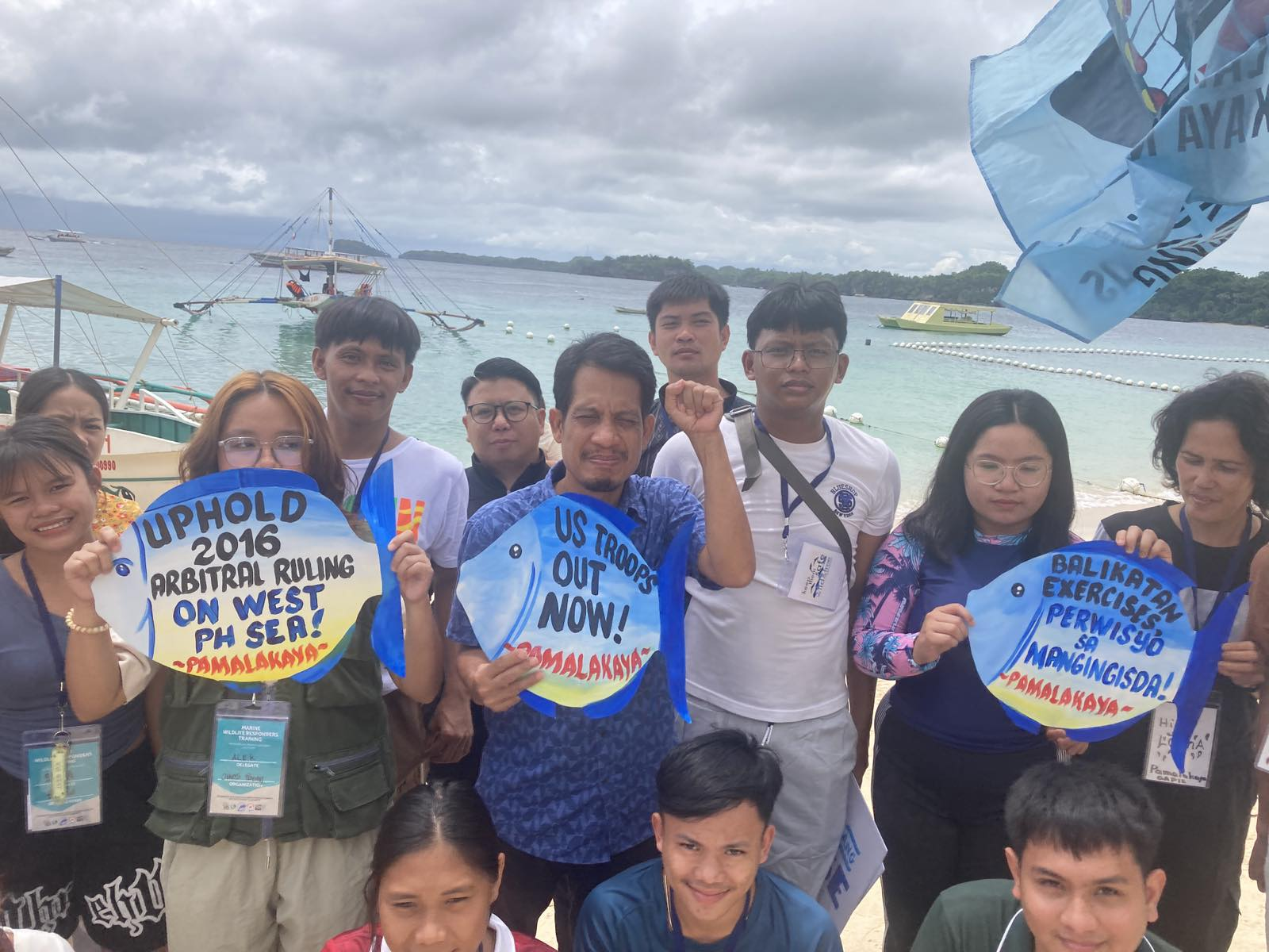Members of the Pamalakaya gather in Guimaras Strait to call on China to uphold the 2016 arbitral ruling on the West Philippine Sea amid the ruling's 9th anniversary on Saturday, July 12, 2025. (Photo: Pamalakaya)