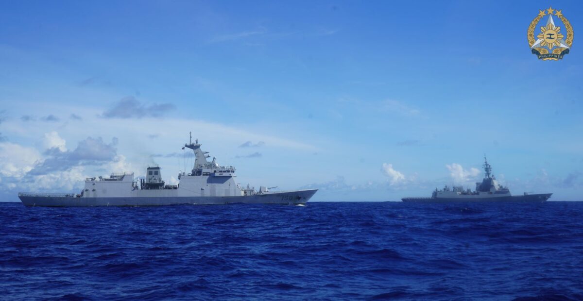 BRP Jose Rizal (FF150) and HMAS Brisbane (DDG41) maneuver in formation off Lubang Island in Mindoro as part of Exercise Alon on Tuesday, August 19.
