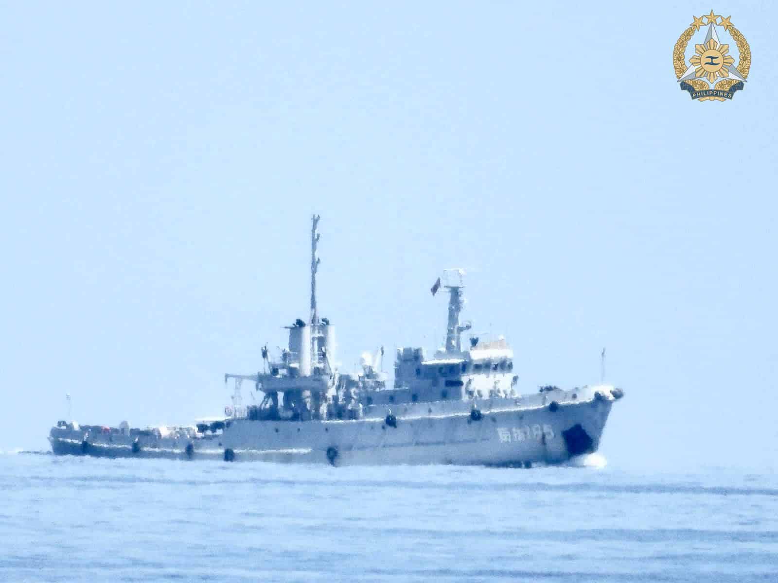 A Chinese Navy tugboat is spotted about five nautical miles away from BRP Sierra Madre in Ayungin Shoal in the West Philippine Sea.