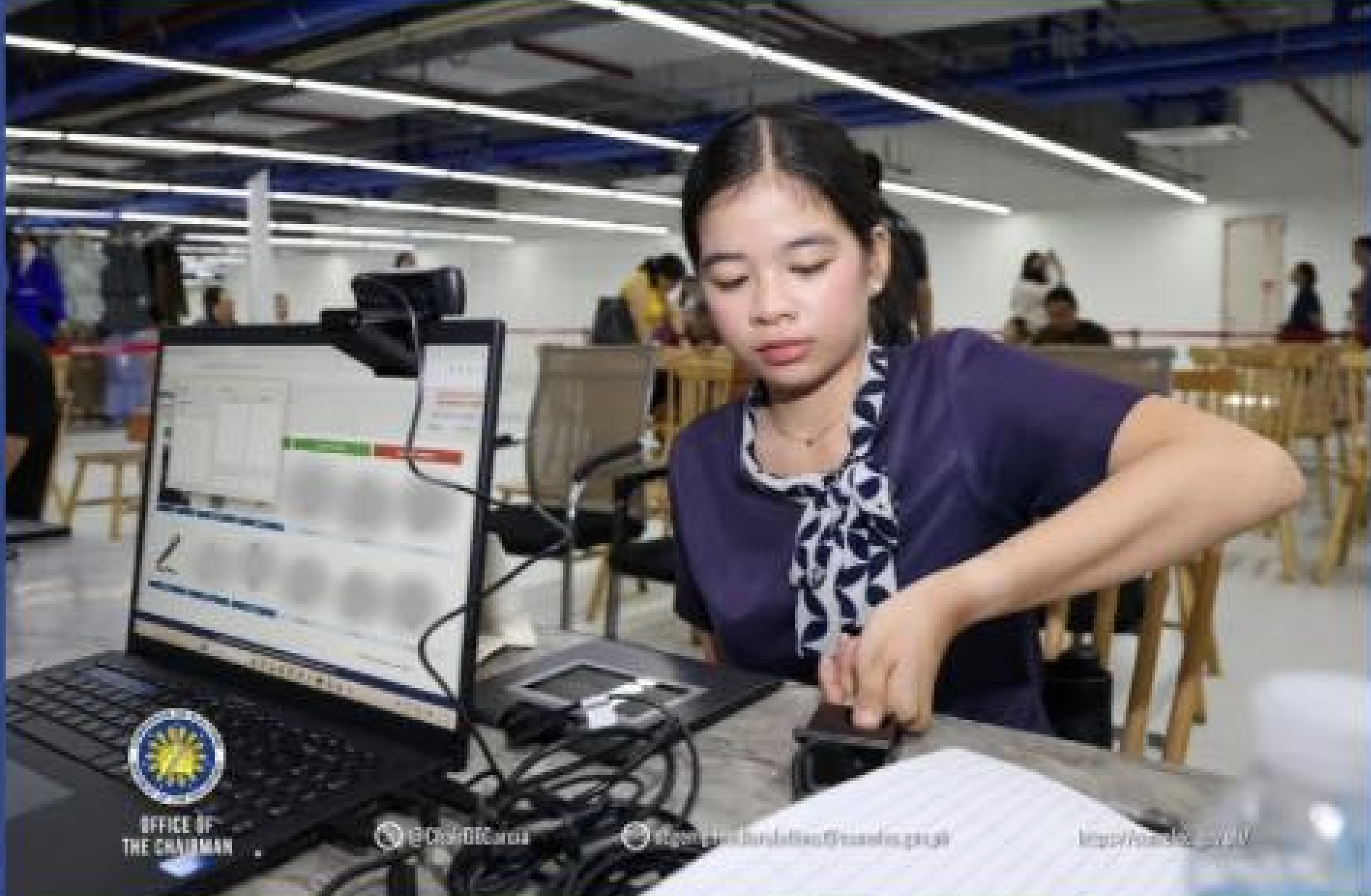 A woman registers as a voter for the Barangay and Sangguniang Kabataan Elections at the Special Registration Anywhere Program site set up by the Commission on Elections at the Parañaque Integrated Terminal Exchange on Wednesday, August 6, 2025. — Photo from Comelec/Facebook