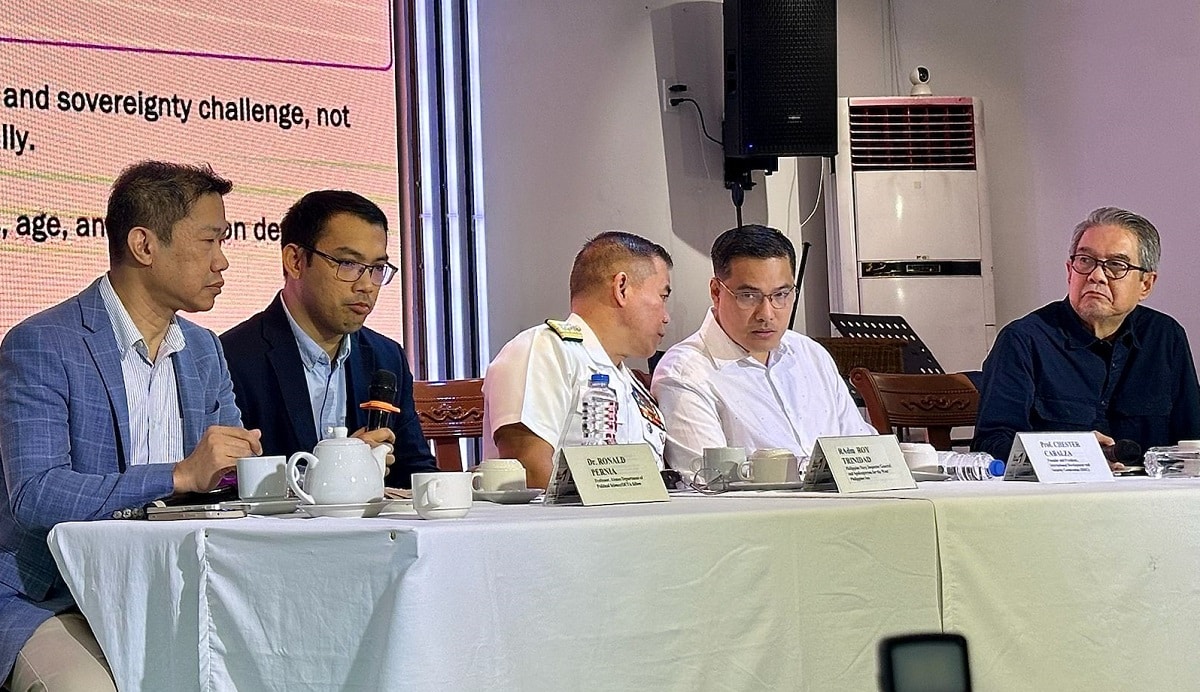Security analyst Prof. Chester Cabalza (center), Philippine Navy spokesperson for the West Philippine Sea Rear Adm. Roy Vincent Trinidad (left), and OCTA Research fellow Dr. Ronald Pernia (right) discuss security challenges and election risks during a news forum on Saturday in Quezon City.