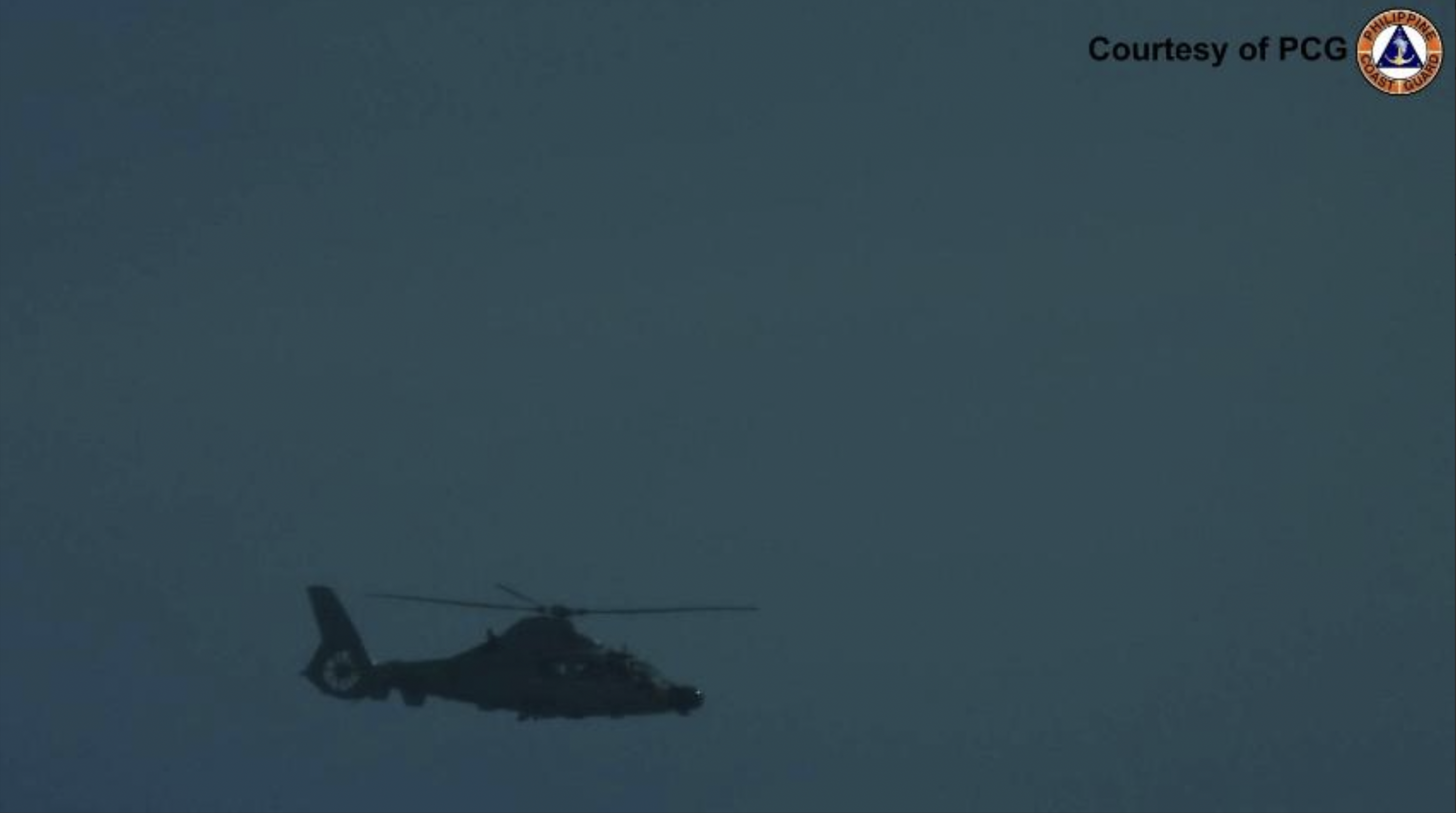 A People's Liberation Army-Navy chopper spotted by Bureau of Fisheries and Aquatic Resources maritime domain awareness flight in Panatag Shoal on November 21, 2025. —Photo from PCG
