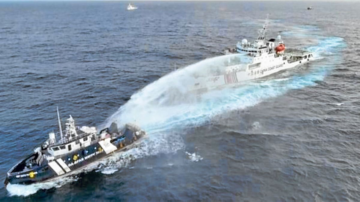 China Coast Guard ship firing a water canon
