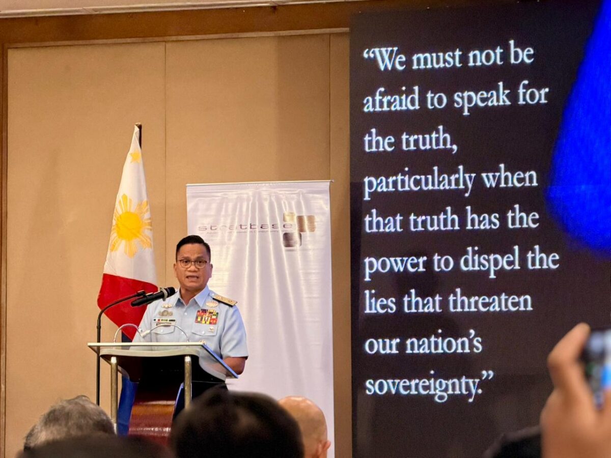 Philippine Coast Guard spokesperson for the West Philippine Sea Commodore Jay Tarriela discusses foreign information manipulation and interference during a Stratbase ADR Institute forum in Makati City on Friday. (Photo by: Gabryelle Dumalag)