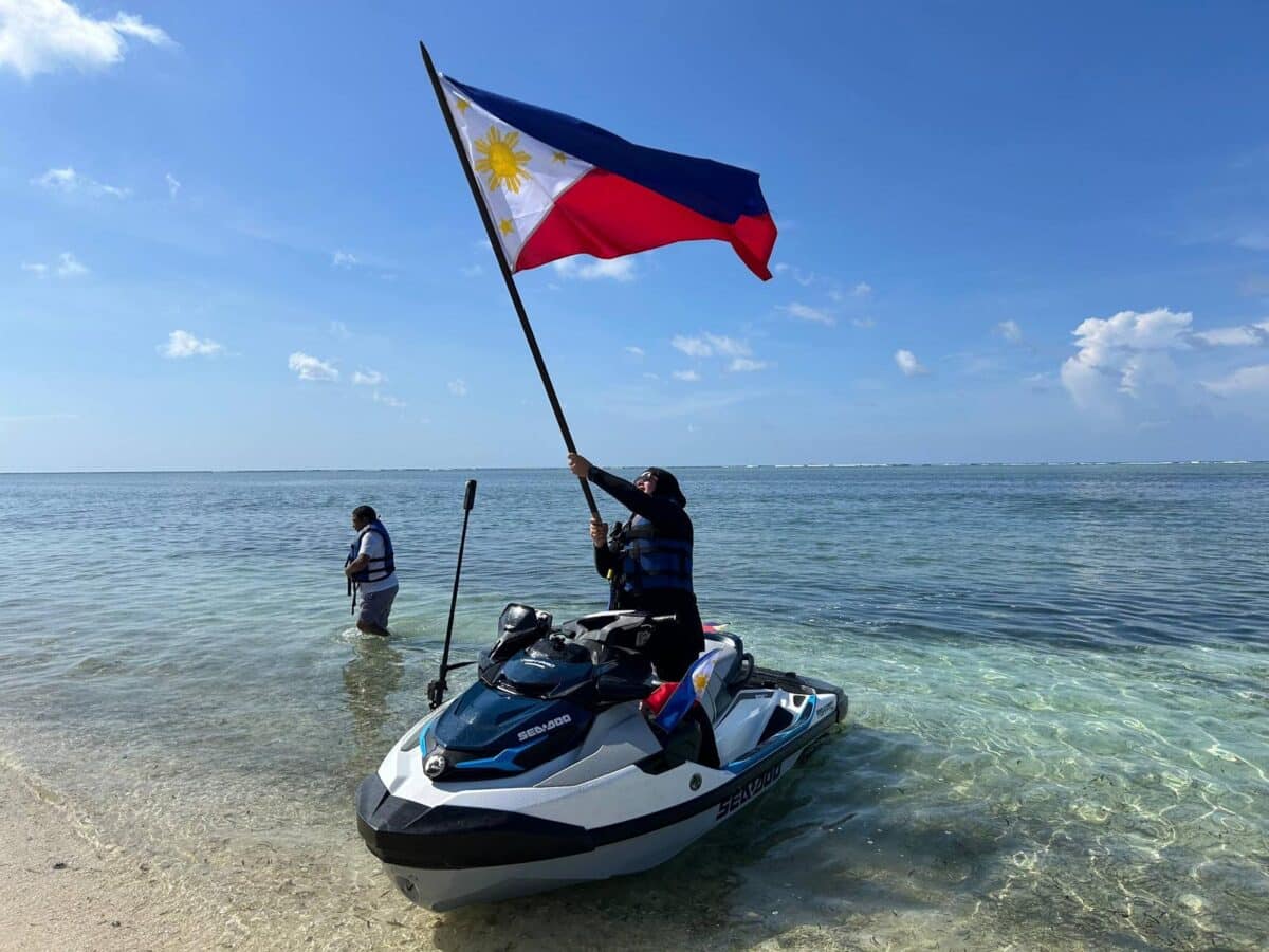 Atin Ito holds first patriotic jetski flag ride off Pag-asa Island