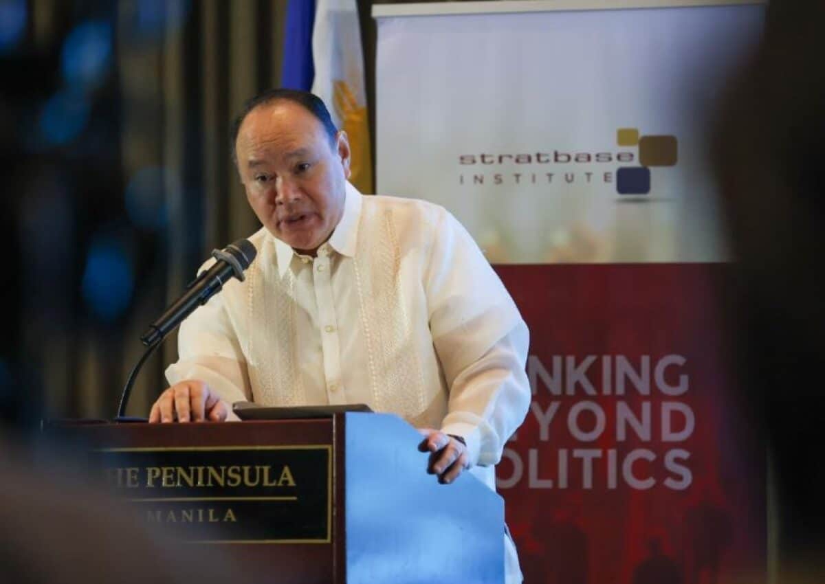 Defense Secretary Gilberto Teodoro Jr. delivers his speech on Friday during the Stratbase Institute’s commemoration of the 10th anniversary of the landmark 2016 arbitral award in Makati City. Photo from Stratbase Institute