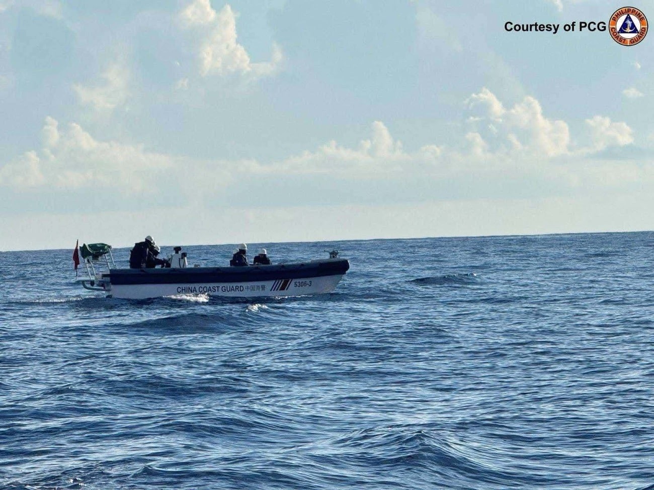 PCG personnel aboard a rubber boat conducts an emergency medical evacuation for Philippine Navy personnel stationed aboard BRP Sierra Madre (LS-57) off Ayungin Shoal on Thursday, Oct. 8. (Courtesy: PCG)